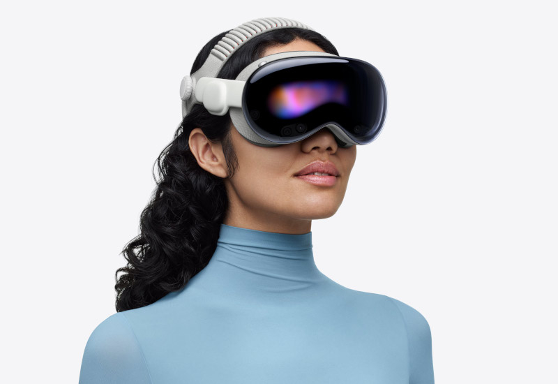 A Apple adiou o lançamento da próxima Vision Pro para 2028, concentrando-se em óculos inteligentes e dispositivos com inteligência artificial.